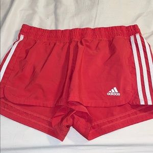 Red Adidas shorts